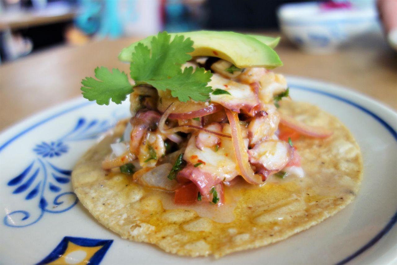 Delight your taste buds with the highly acclaimed seafood tostada at chef Johnny Hernandez's Villa Rica restaurant.