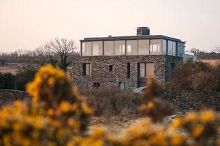 The farm track that leads to Camel Quarry House is an unlikely introduction to this stylishly minimalist retreat  a...