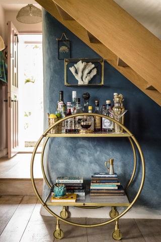 This traditional thatch cottage is packed with vintage finds that make the interiors more bohemian than beachy. Velvet...
