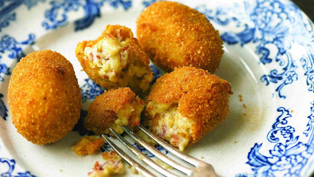 Croquetas are tubes of bechamel sauce encased in fried breadcrumbs. Jamon and salt cod are popular fillings. (Image credit: 