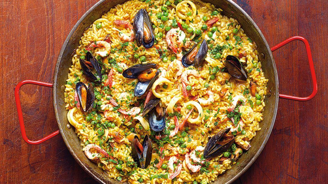 Originating in the region around Valencia, paella traditionally comes in two varieties: paella Valenciana (with rabbit and chicken) and seafood paella. (Image credit: 